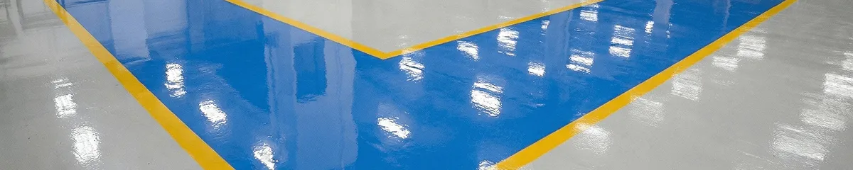 A factory floor professionally covered and marked with epoxy flooring in Columbus, OH